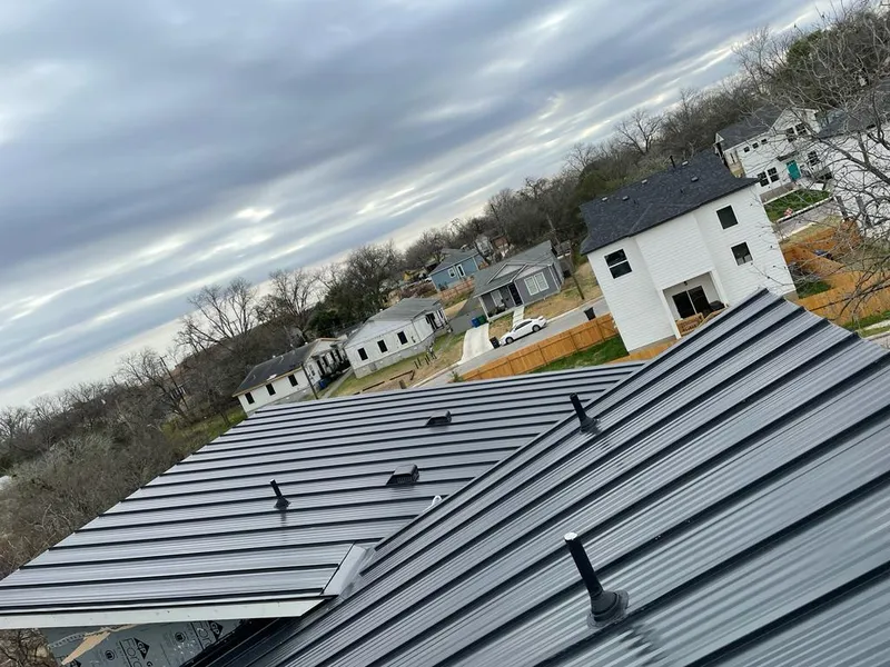 Standing seam metal roof panels with vents for Skylight Repair in Oak Hills